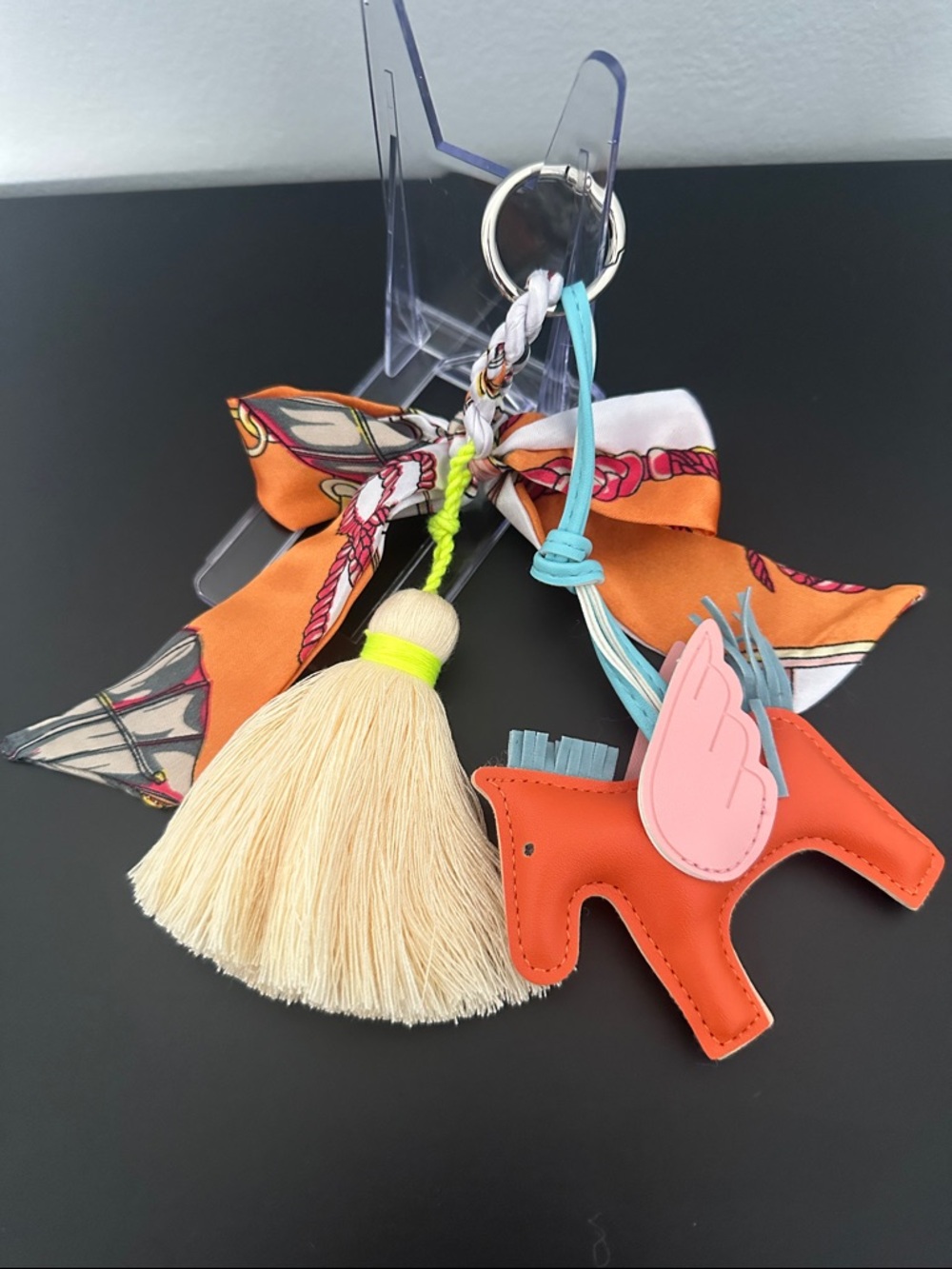 Tassel & Orange Pony Keychain with Scarf Accent